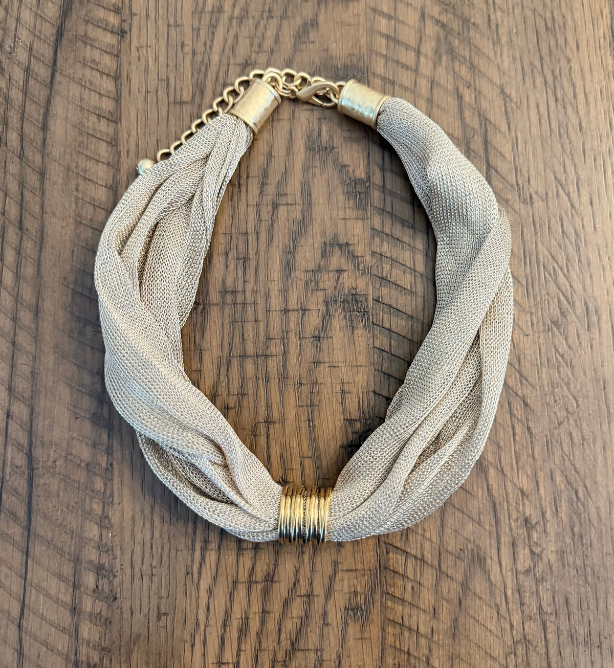Gold mesh chain with ring pendant