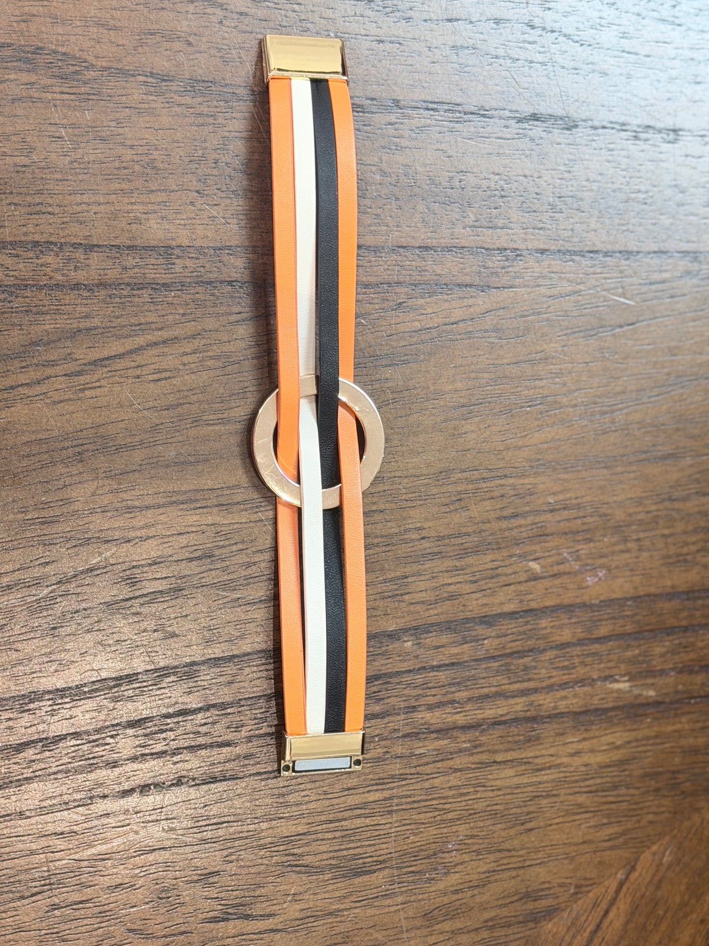 Orange, black, white magnetic glass bracelet ￼