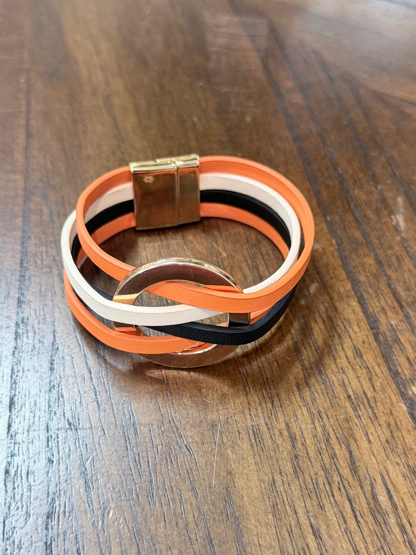 Orange, black, white magnetic glass bracelet ￼